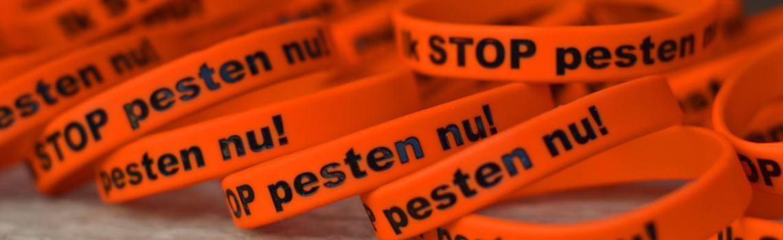 Achter het pesten